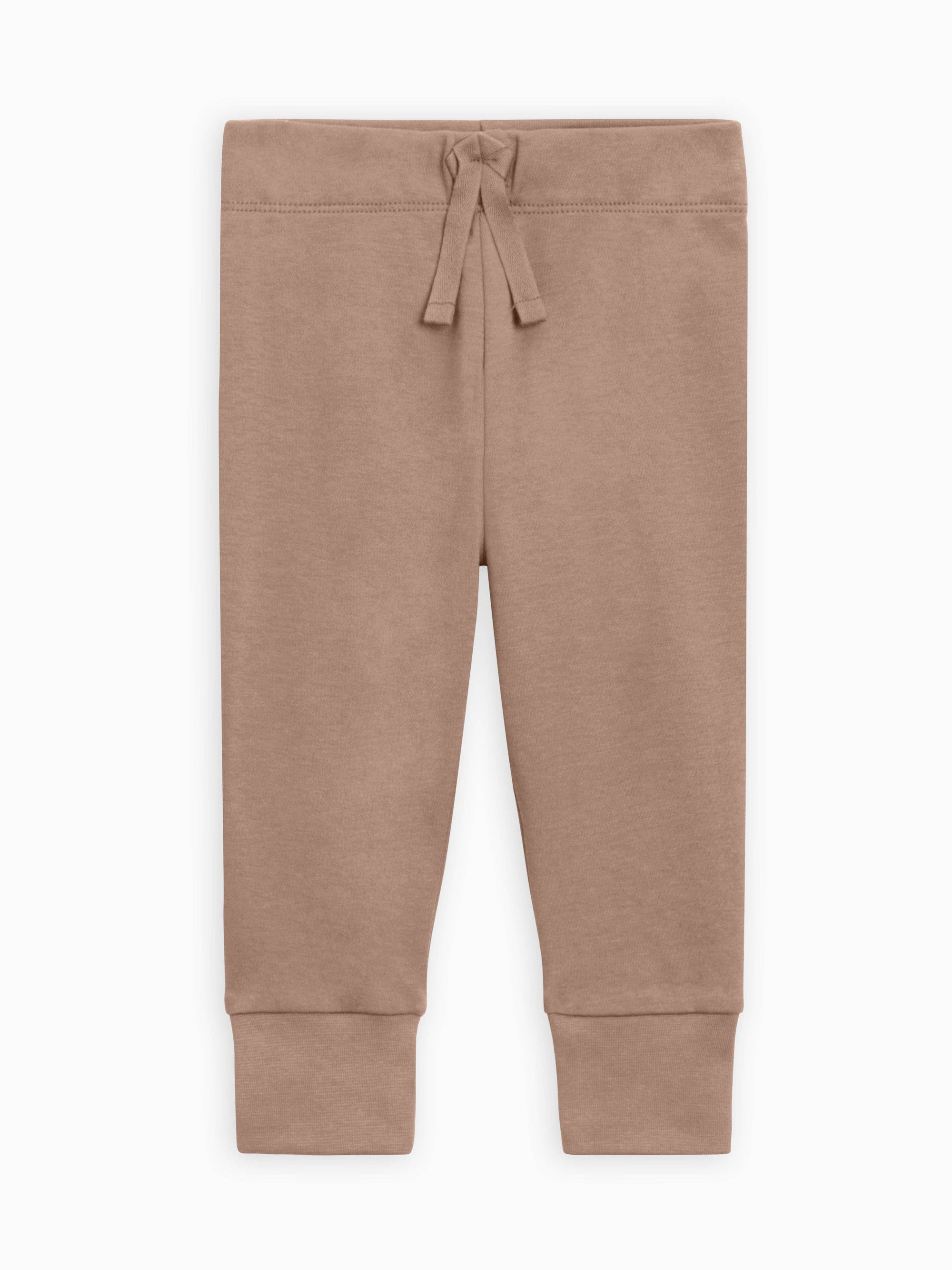 Brown jogger pants with a drawstring on a white background