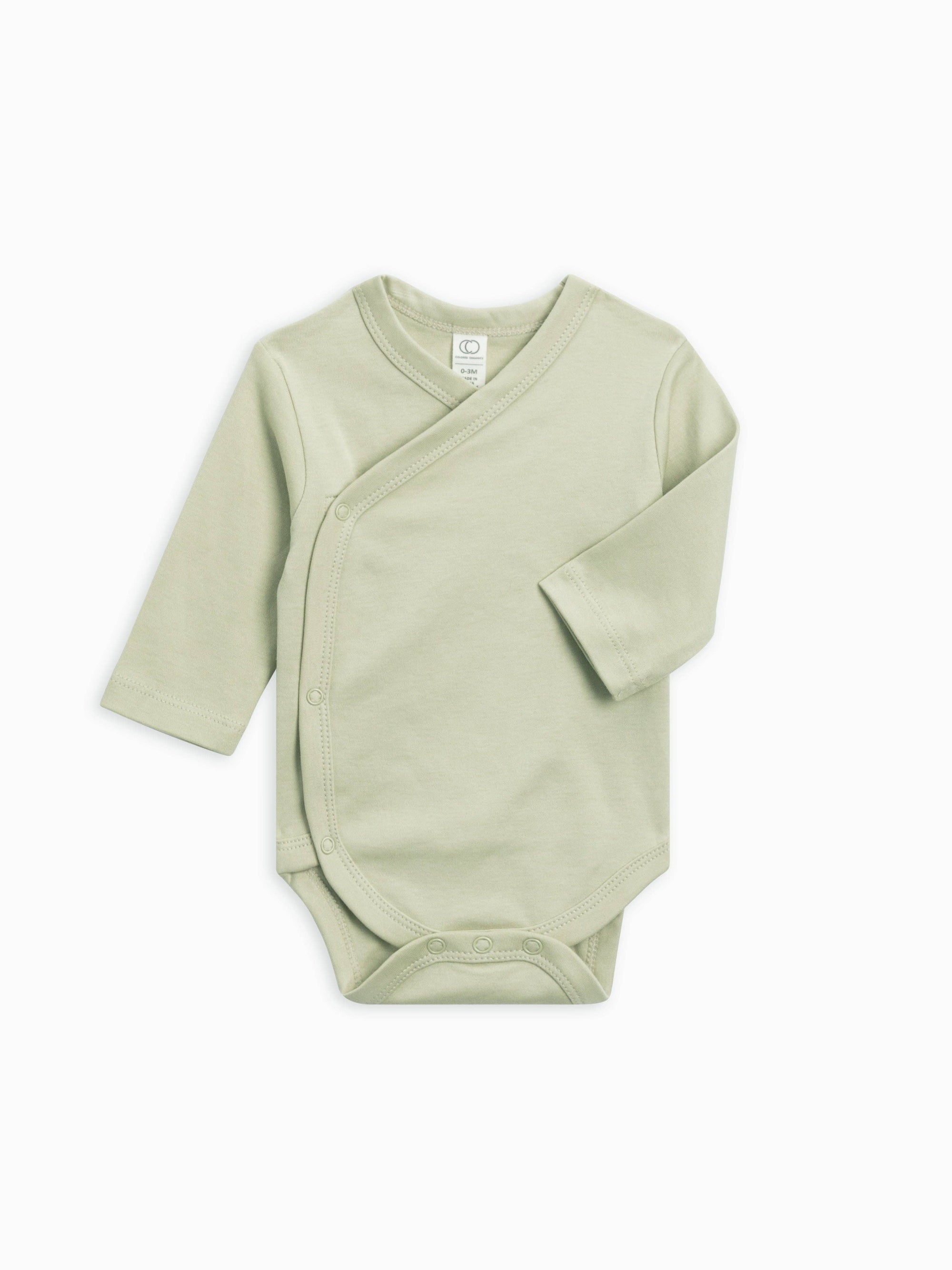 Light green baby wrap onesie on a white background