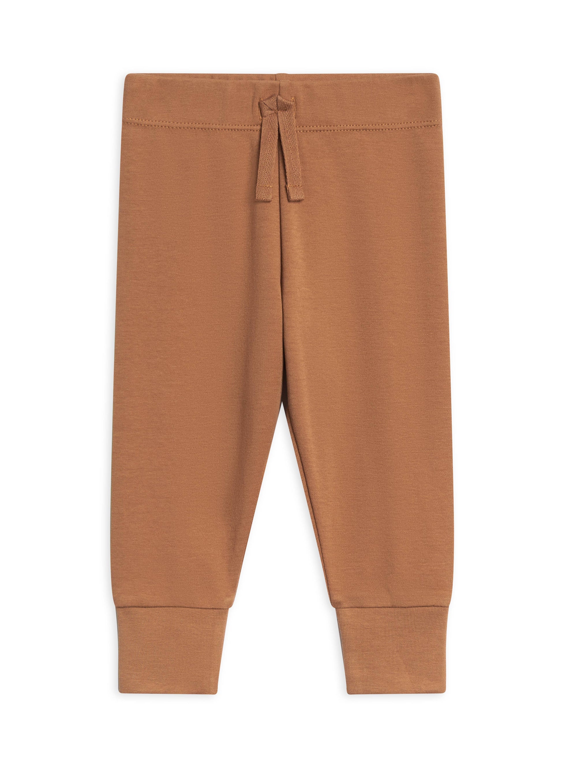 Brown baby pants on a white background